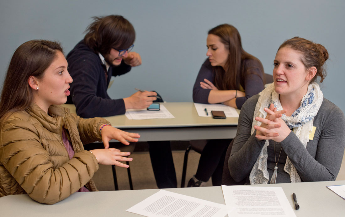 photo - students teach each other english and spanish in a CMC Intercambio class