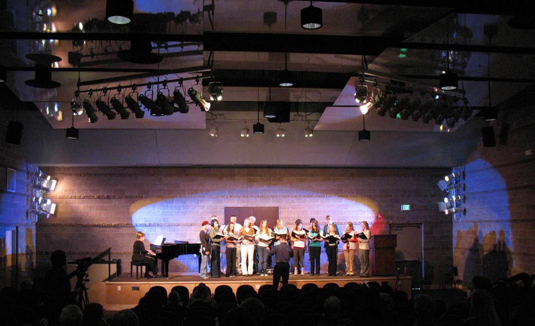 photo - a choir performs in the auditorium at CMC Rifle