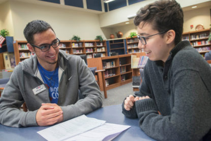 photo: Upward Bound program students working with a tutor