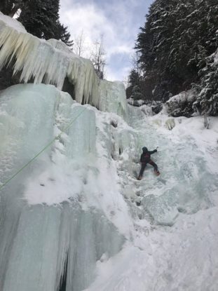 photo: CMC Leadville ORL student ice climbing a wall in Vail