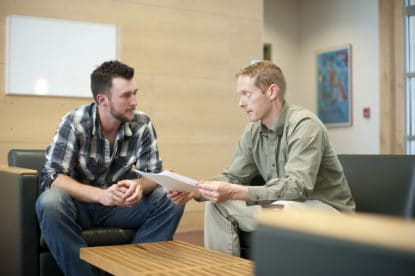 Counselor and student discussing schedule
