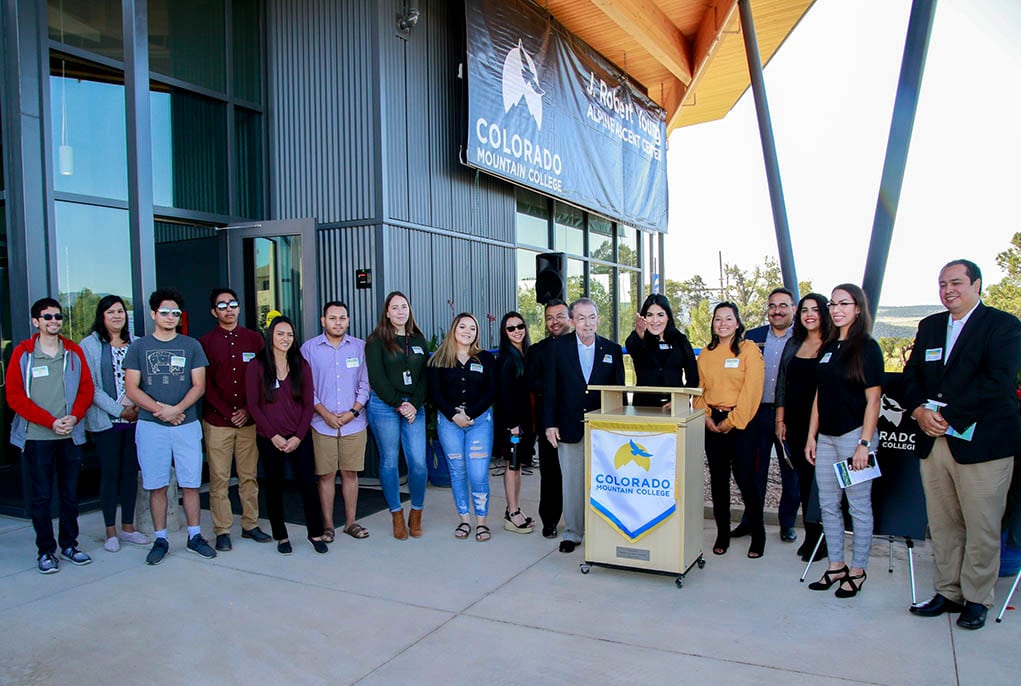 Bob Young with recipients of the Alpine Bank Latino/Hispanic Scholarship speak at the dedication of the new J. Robert Young Alpine Ascent Center.