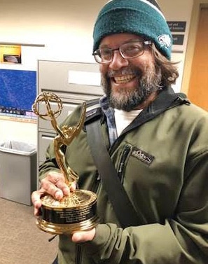 Associate Professor of Social Science Patrick Staib with his Emmy