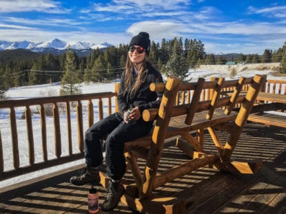 CMC Leadville student sitting on an outside deck