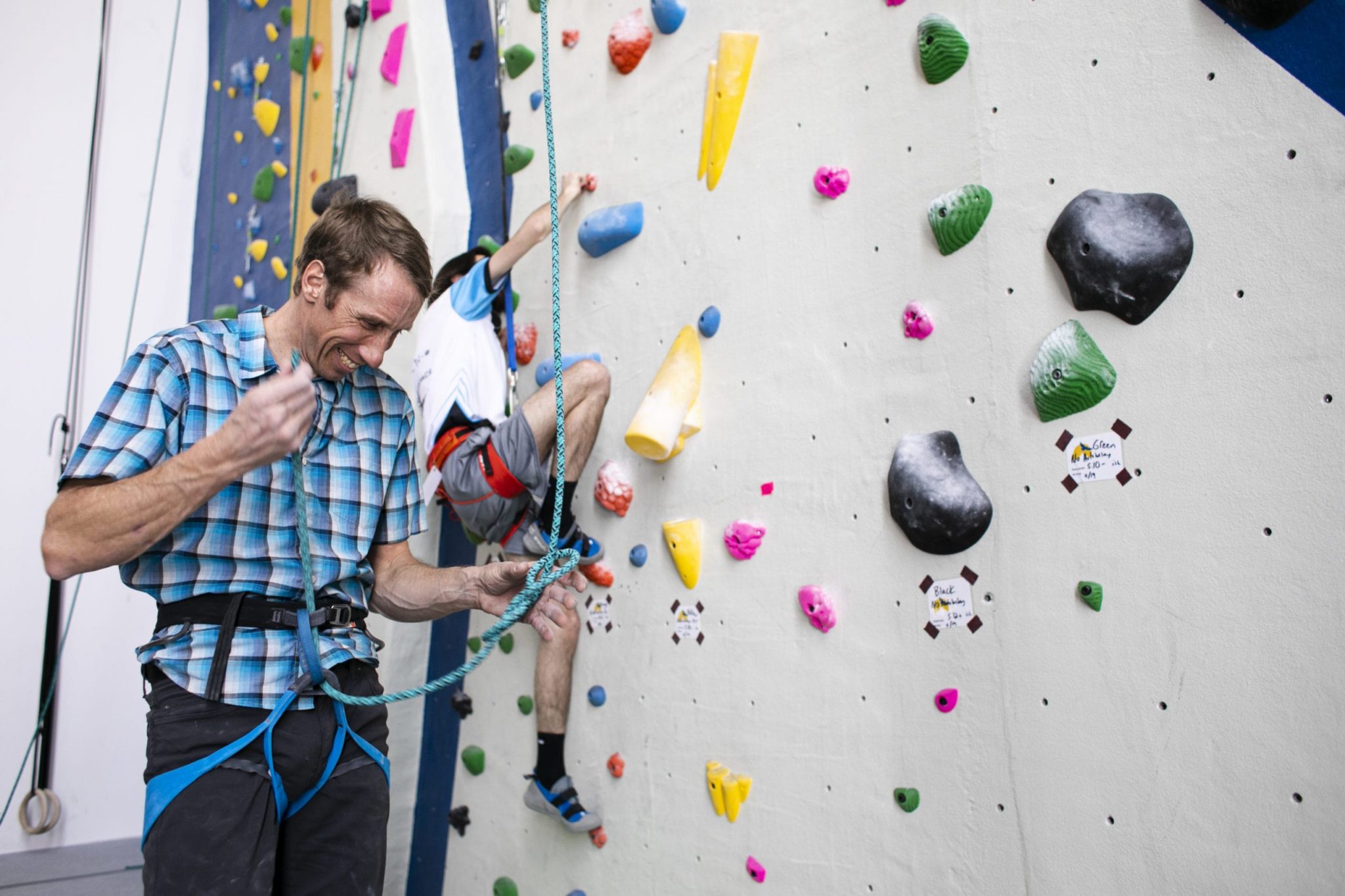 Patrons using climbing wall on Spring Valley campus.
