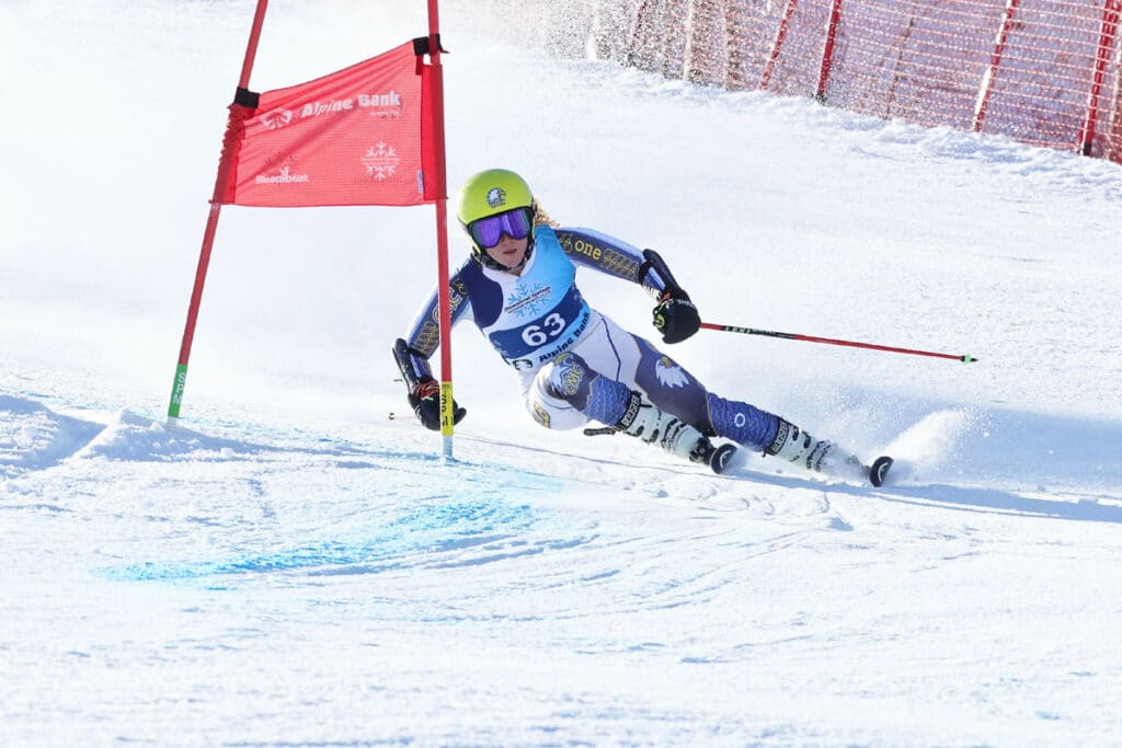 skier racing down the hill