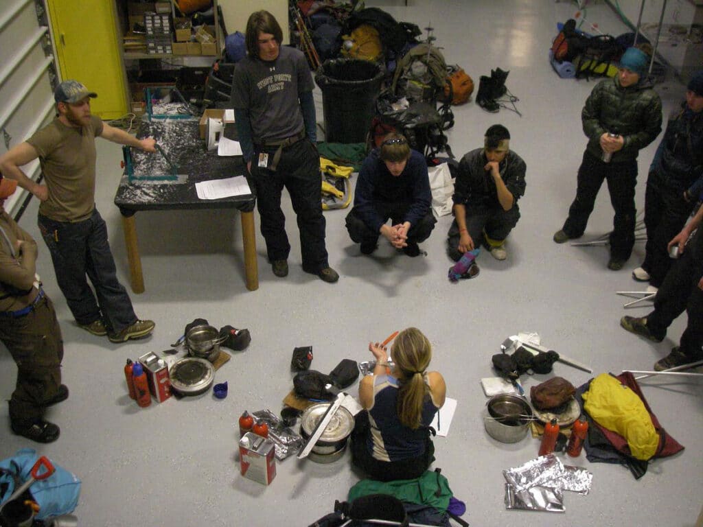 CMC Outdoor Recreation Leadership students go over winter camping gear at CMC Leadville.
