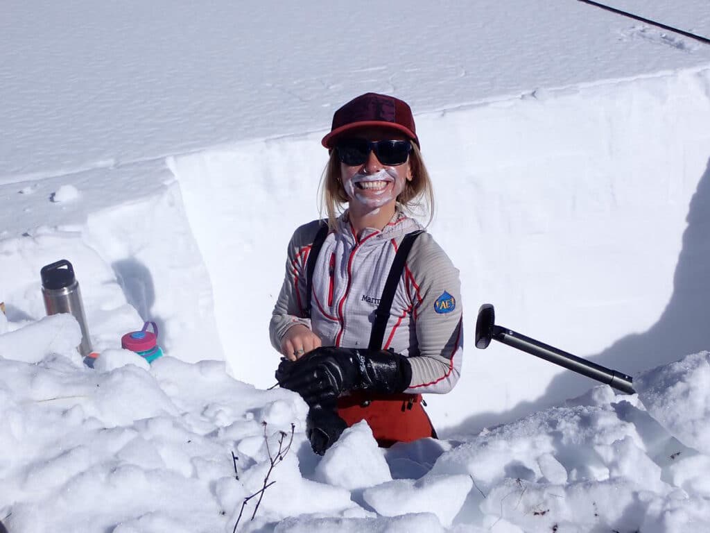 CMC Outdoor Education student in an avalanche snow pit.