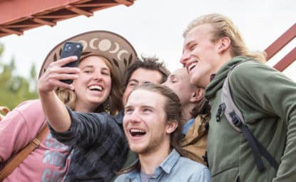 group of students taking a selfie.