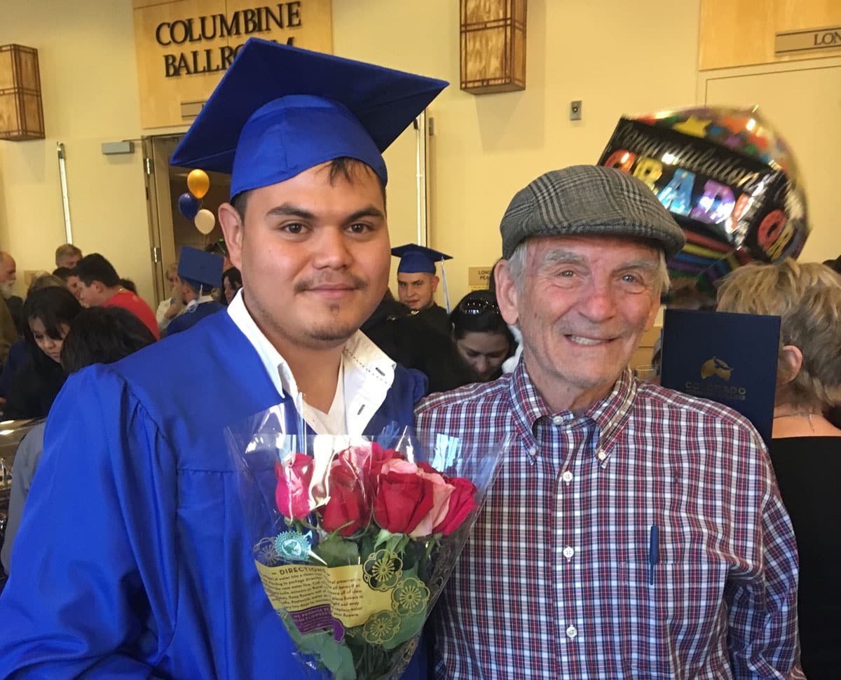 Mountain Scholar with his mentor at graduation