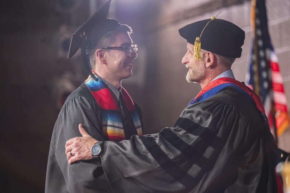 CMC President Matt Gianneschi, right, congratulates Joel Lopez Esparza who earned a Bachelor of Science in business administration at CMC Rifle's commencement on Dec. 6.