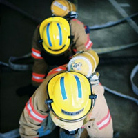 CMC fire academy students training in drill